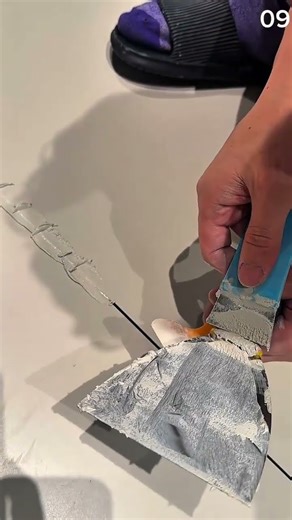 Steps for applying grout mixture to floor gaps to close them