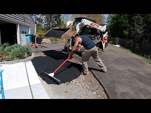 Large asphalt driveway patch
