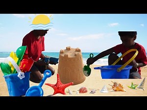 Kids playing on the beach with sand and colorful toys. build sandcastle/Learn colors for toddlers