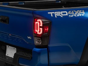 Raxiom Tacoma XW Series Sequential LED Tail Lights; Black Housing; Clear Lens TT30331 (16-23 Tacoma) - Free Shipping