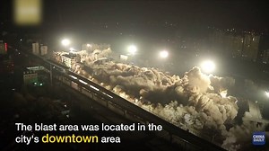Nineteen buildings in #Wuhan's downtown area were #demolished by five tons of explosives in only 10 seconds on Saturday, in order to build a new #business district in the capital of central China's #Hubei province. The blast area was located in the city's downtown area which lies next to a light rail viaduct, residential communities, a shopping mall and a transformer substation. The demolition team erected more than 120,000 protective screens and prepared five tons of #explosives. In order to gu