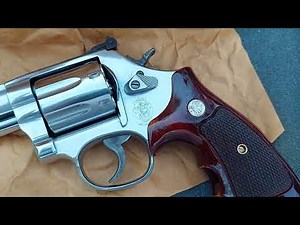 Smith & Wesson 686 Stainless Steel Revolver with Custom Wood Grips .
