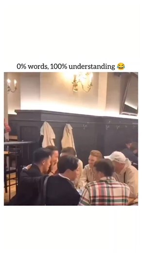 guffvibes on Instagram: "The video is a short comedic clip that focuses on non-verbal communication and camaraderie between a group of friends/colleagues sitting at a table in a restaurant or pub. Title/Theme: The text overlay on the video is "0% words, 100% understanding" which sets the theme of silent communication. Action: The central part of the video involves one man communicating a desire or instruction to the person sitting next to him using only hand gestures, head nods, and facial expre