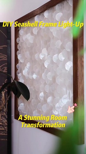 DIY Seashell Art: A Stunning Room Transformation! I just put up a DIY frame I made with natural seashells, and it totally transformed my room’s style! 🐚💡 Grabbed some wood from Home Depot, painted it my fave color. Made it about 1.5-2 inches thick to hide the LED strip and switch in the back. For the crafty part, I used seashells with a 2-inch diameter – they already had holes, which was super convenient. And for the fishing line, I went with a 0.15-inch diameter. Pro tip: before threading tho
