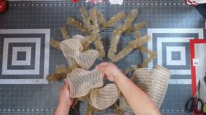 7.8K views · 141 reactions | Learn how to add deco mesh to a wreath frame using this quick beginner-friendly tutorial. This step-by-step wreath-making guide shows you how to prepare your mesh, attach it securely, and build a full, fluffy base for any season or holiday. Perfect for new wreath makers who want to create beautiful home decor with ease. Try this deco mesh technique for your next DIY wreath project and start designing like a pro! | DecoExchange | Facebook