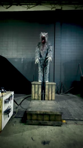 Jumping Wolf by Poison Props. Giant werewolf starts over 11’ tall before jumping down to loom over your terrified patrons! https://www.poisonprops.com/jumping-wolf.html | POISON PROPS