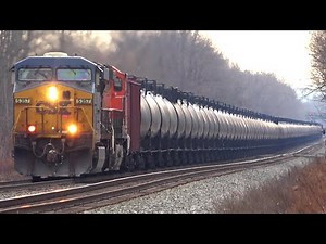 CSX and NS Trains Meet! CSX BNSF Tank Train! NS Manifest Train! CSX Train In The Rain! + More Trains