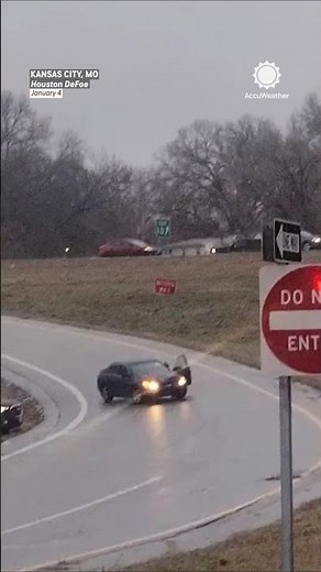 WATCH: Driver Jumps Out of Car Sliding on Ice!