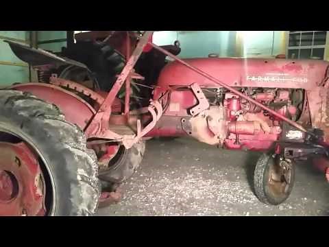 Removing the sickle bar mower from the 1955 Farmall Cub