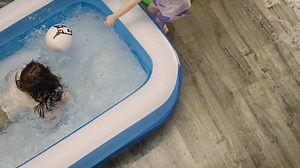 A young boy is trying to escape a deserted island. His volleyball friend might not make it, but PERGO Outlast flooring can survive splashes up to 24 hours. | Pergo