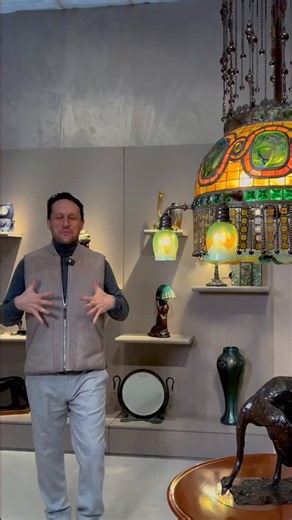Macklowe Gallery on Instagram: "This extraordinary chandelier by the Tiffany Glass and Decorating Company draws inspiration from Byzantine crown designs, particularly those seen in Hagia Sophia. Tiffany translated global motifs—wirework, interlaced geometry, and layered crown forms—into a distinctly American object. From the turtleback glass crown at the top, to chains of ruby and citrine glass reflecting Tiffany’s fascination with gemstones, every element showcases the full vocabulary of Tiffan