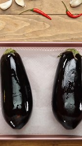 Turn your eggplant game from bland to grand! 🍆✨ Learn the art of spicing it up with garlic and peppers for a dish that's as fantastic as it is flavorful. 🔥🌶️ ❤️Full Recipe❤️ https://www.tastelife.tv/recipe/baked-eggplant-with-garlic_18015.html | Taste Show