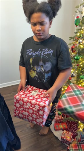 Holiday Gift Reactions: A Christmas Surprise Unwrapped