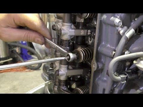 Outboard valve clearance adjustment