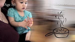 Toddler signing cook in American Sign Language
