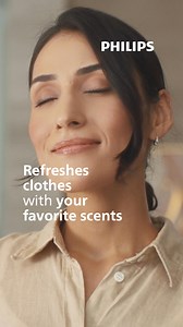 Philips MyEssence Garment Steamer. Refreshes clothes with your favourite scents and effortlessly removes wrinkles on all ironable garments. | Philips Home Living