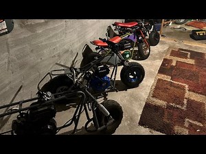 Spring loaded chain tensioner