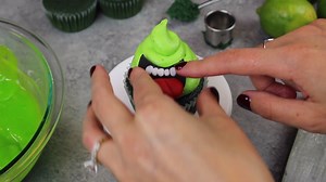 These Ghostbuster-inspired Slimer cupcakes are made w/ fluffy lime cupcakes & a lime curd slime filling. They're equally spooky & delicious! The full recipe can be found here: https://chelsweets.com/2020/10/14/ghostbusters-cupcakes/ | Chelsweets