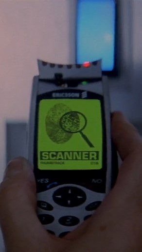 The Ericsson JB988 mobile phone was a gadget famous for being a fingerprint scanner, lock pick and 20,000 volt taser, as well as opening up and transforming into a touchpad remote control which allowed Bond to drive the BMW 750iL from the back seat of the car. #TomorrowNeverDies #JamesBond #PierceBrosnan | James Bond 007