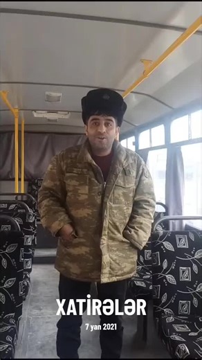 Bus Conversation Highlights in Camouflage Jacket