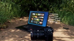 SanDisk 1TB Extreme Portable SSD - Up to 1050MB/s, USB-C, USB 3.2 Gen 2, IP65 Water and Dust Resistance, Updated Firmware - External Solid State Drive - SDSSDE61-1T00-G25