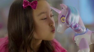 1.5K views · 31 reactions | Now you can bring home your very own dancing magical unicorn! The Enchanted Unicorn can’t wait to meet you. Will you be able to unlock her hidden abilities? #Zoomer #ZoomerWorld #ZoomerUnicorn | Spin Master Global | Facebook