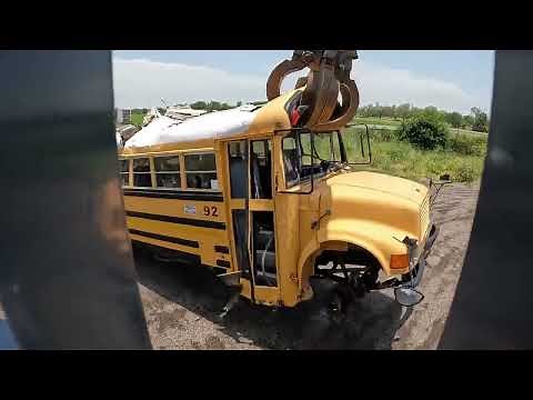 tearing apart a bus for scrap RECYCLING