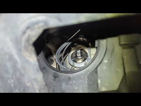 BMW E84 X1 headlight globe replacement. Headlamp globe installation