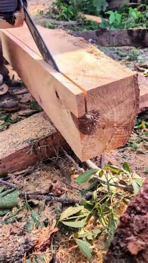 Processing lumber with a chainsaw