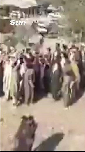 Huge crowd gathers as Taliban force boy to execute family’s killer in Afghanistan #afghanistan
