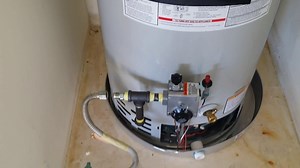 Installing Drip Pan Under Water Heater | Heaterview