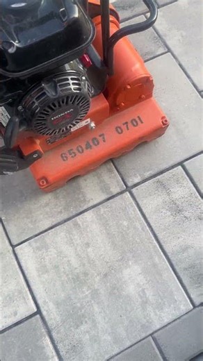 Getting the polymeric sand down in the paver joints