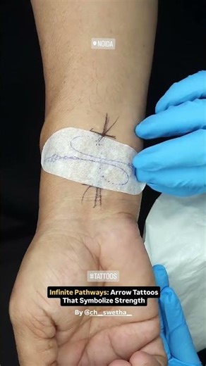 Infinity with Arrow Tattoo | Minimalist & Meaningful Custom Tattoo Design