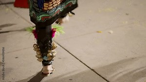 People dancing the traditional Mexican Aztec dance at night