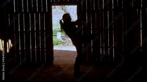 Native American Man Shadow Boxing Fight Training in Old Wooden Building