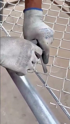 Installing Chain-Link Fencing: The Detailed Process of Securing the Mesh to the Pole