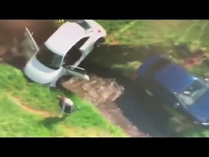 LiveLeak - Police car and 'stolen' vehicle plough into ditch after chase