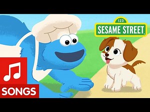 Sesame Street: Cookie Monster's Doggie Treats Song! | #FurryFriendsForever - Videos For Kids