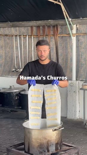 Hamada Sho on Instagram: "So let me tell what happened a couple of days ago. There is a shelter for displaced people close to the kitchen where I cook. The kids there know me, some of them follow my social media and have seen my videos ❤️ They asked me to make them burgers and a dessert! There’s no meat 🥩 at all in the market (for weeks now) so we settled for the dessert.. I was feeling 🇪🇸 / 🇵🇹 vibe, and I thought “let me make Churros again! It was a hit last time , why not try it again?! A