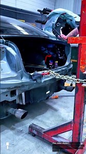 Straightening a Bent Rear Car Frame Using a Pulling Chain