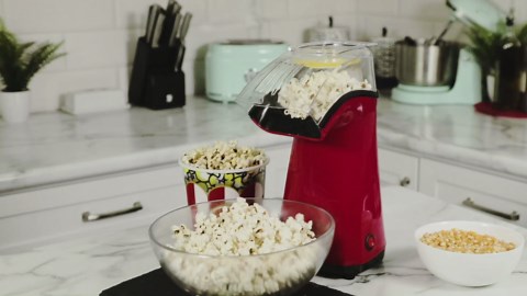 Nostalgia Hot-Air Electric Popcorn Maker, 12 Cups, Healthy Oil Free Popcorn with Measuring Scoop, Red