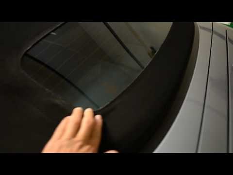 Re-glued the glass onto the Crossfire Convertible top..