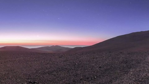 Why Hubble Struggles with Pluto but Sees Galaxies Clearly