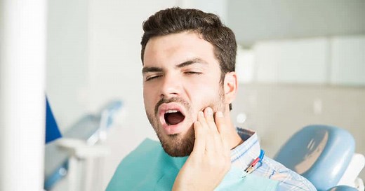 Wisdom Tooth Pain: Causes, Treatments, and Home Remedies - Dentaly.org
