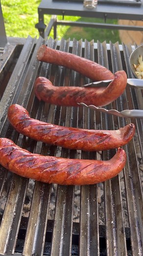 Delicious Grilled Kielbasa with Cheesy Onions Recipe