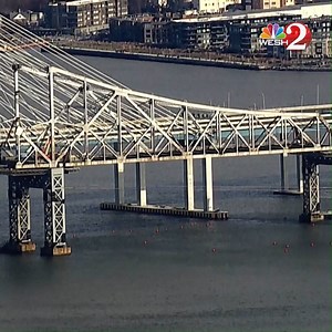 DOWN IT GOES: One of the last sections of New York's old Tappan Zee Bridge was demolished this morning. | WESH 2 News