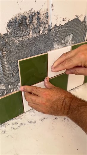 James Treble on Instagram: "Another job done 🤩 I needed a splashback in the alfresco, so I decided to have a little play with pattern and add a checkerboard. Fun, fresh and perfect for entertaining. I went with green and white to tie in with the surrounding greenery and even the pizza oven. These 100 x 100 tiles are cost effective, come in a great range of colours, and make it easy to add a bit of personality. Proof that a small amount of pattern can bring a space to life. Let me know what you 