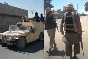 Taliban parade in US Humvees & chant 'Allahu Akbar' as they seize Afghan city