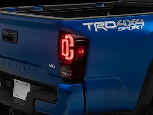 Raxiom Tacoma XW Series Sequential LED Tail Lights; Black Housing, Red Lens TT30332 (16-23 Tacoma) - Free Shipping