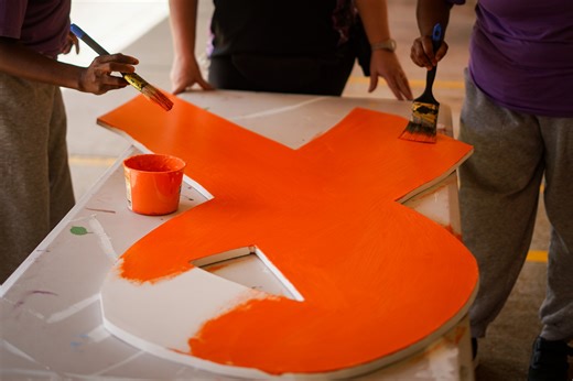 The Department of Justice is proud to support the 16 Days in WA campaign, led by Department of Communities, which calls for an end to violence against women and children. Women and men across our prisons, including women at Greenough Regional Prison, are preparing to show their solidarity during this important campaign. From orange crocheted flowers to a large orange ribbon advocating for change, these women are working hard to ensure everything is ready for their internal march. Through this pr